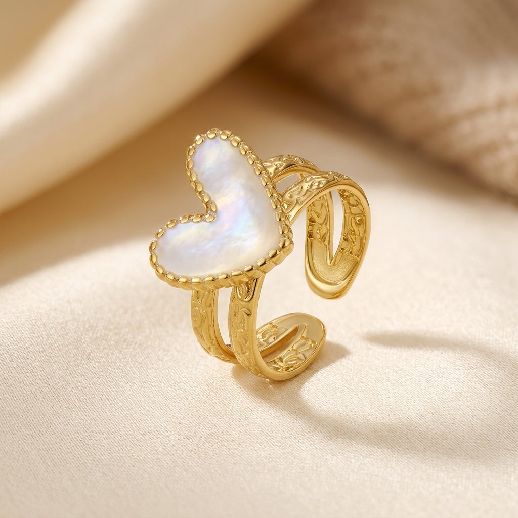 Gold heart motif ring