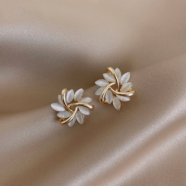 Gold circular earrings with opal leaves