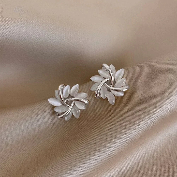 Gold circular earrings with opal leaves